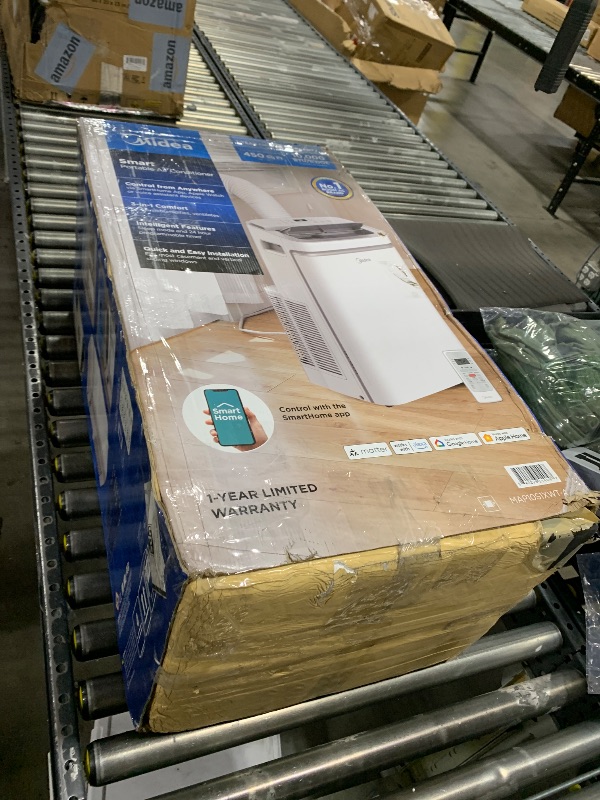 Photo 1 of Midea 14,000 BTU ASHRAE (10,000 BTU SACC) Portable Air Conditioner, Cools up to 450 Sq.Ft., with Dehumidifier & Fan mode