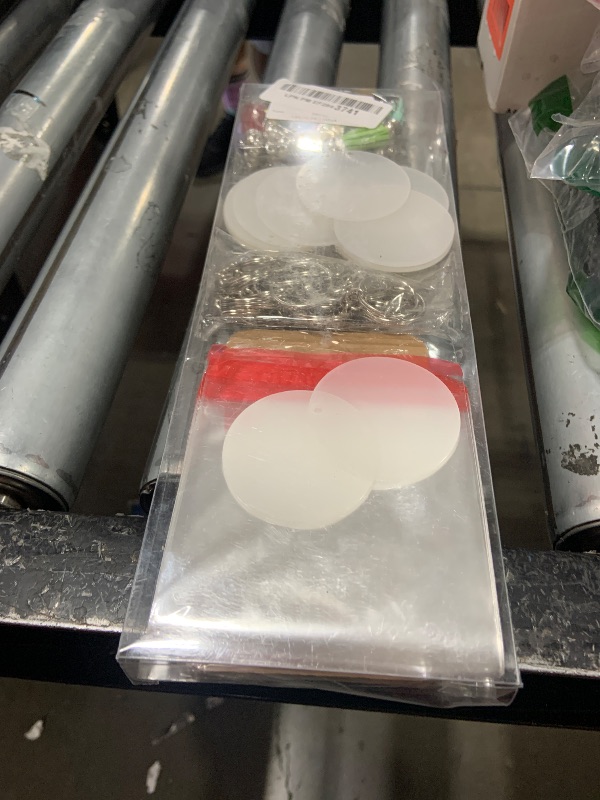 Photo 1 of ZOCONE 144 PCS 2 INCH Acrylic Keychain Blanks Set, Clear Circle Acrylic Blank Bulk with Keychain Ring, Display Card, Packing Bag, Jump Rings, Tassels for Vinyl DIY Keychain Earring and Craft Project