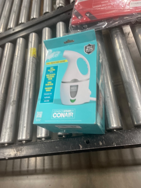 Photo 1 of Conair Handheld Travel Garment Steamer for Clothes, CompleteSteam 1100W, For Home, Office and Travel, White