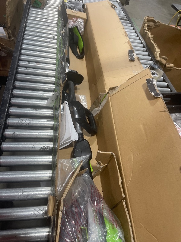 Photo 1 of Greenworks 82V 24" Brushless Cordless Short Pole Hedge Trimmer, 2.5Ah Battery and Dual Port Rapid Charger (Great for Landscapers and Professionals)
