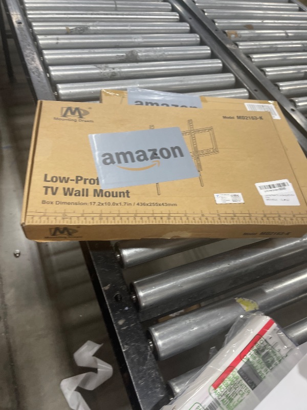 Photo 1 of Mounting Dream TV Mount Fixed for Most 42-84 Inch Flat Screen TVs, TV Wall Mount Bracket up to VESA 600 x 400mm and 132 lbs - Fits 16"/18"/24" Studs - Low Profile and Space Saving MD2163-K