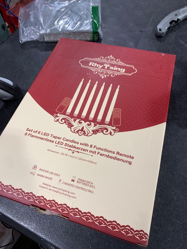 Photo 1 of Rhytsing 11.4" Flameless Taper Candles with Timer Function, Battery Operated Dinner Tall Candlestick Rustic Wax, Warm White LED, 2 Remotes Included - Set of 6 (Ivory)