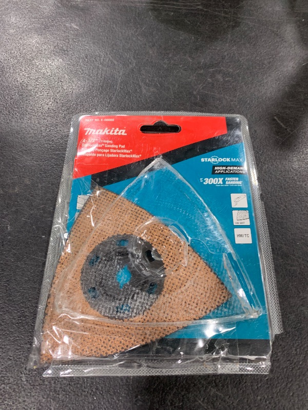 Photo 1 of Makita E-08660 StarlockMax® Oscillating Multi-Tool 4-1/2" Tungsten Carbide 100 Grit Delta Triangle Sanding Pad