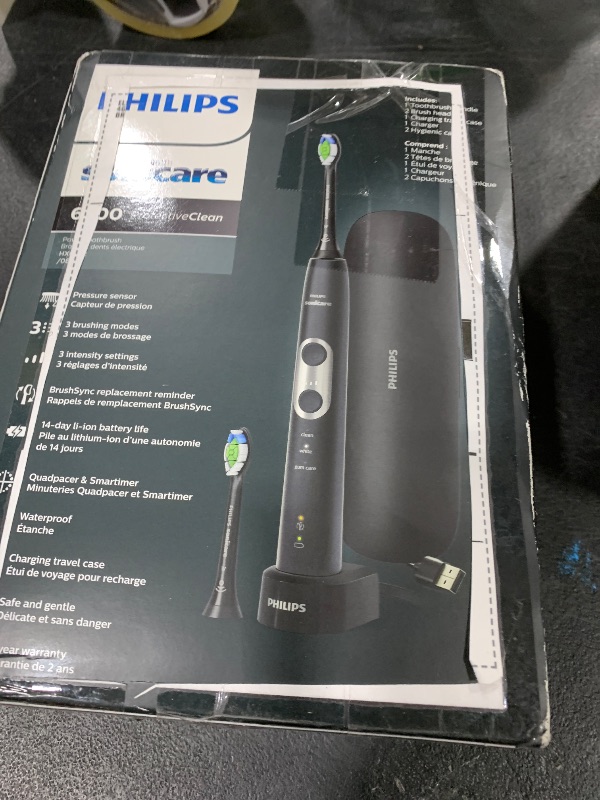 Photo 1 of Philips Sonicare ProtectiveClean 6500 Rechargeable Electric Toothbrush, with Pressure Sensor, 3 Cleaning Modes, SmarTimer and QuadPacer, 14-Day Battery Life, Charging Travel Case, Black, HX6462/08