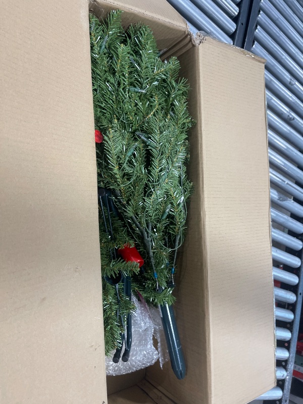 Photo 1 of National Tree Company Pre-Lit Artificial Mini Christmas Tree, Green, Dunhill Fir, White Lights, Includes Stand, 4 Feet