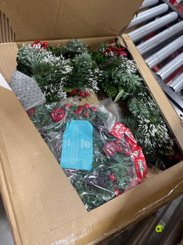 Photo 1 of National Tree Company Pre-Lit Artificial Christmas Wreath, Green, Crestwood Spruce, White Lights, Decorated with Pine Cones, Berry Clusters, Frosted Branches, Christmas Collection, 24 Inches