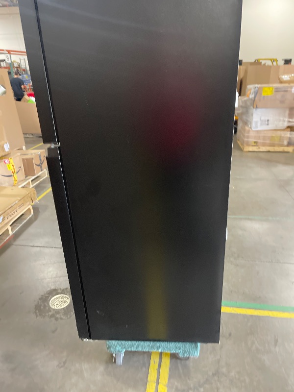 Photo 1 of Kenmore 30 in. 18.2 cu. ft. Capacity Refrigerator/Freezer with Adjustable Glass Shelving, Humidity Control Crispers, Gallon Door Bins, ENERGY STAR Certified, Black