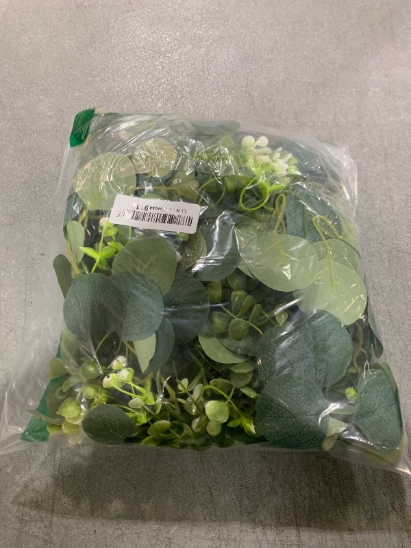 Photo 1 of YIJXPOIN Eucalyptus Garland, 2 Packs 6FTGreen Flower Garland Decor, Artificial Faux Eucalyptus Leaves Greenery Vines for Table Runner Wedding Bedroom Mantle Centerpieces Backdrop Decorations