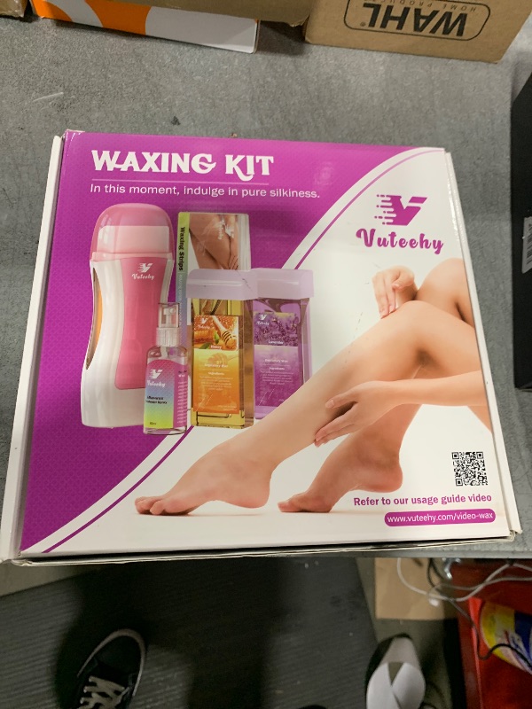 Photo 1 of Vuteehy Roll On Wax kit, Roll on Waxing Kit for Sensitive Skin Hair Removal, Roll on Waxing Kit for Women, At Home Wax Kit for Larger Areas of the Body, with 50 Pcs Strips and 2 Soft Cartridge