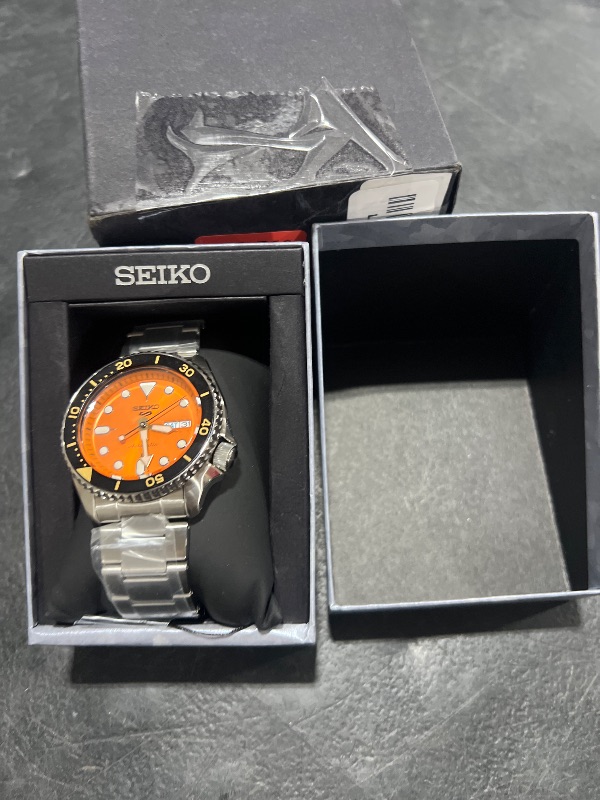 Photo 1 of Seiko SRPD59 Automatic Watch for Men - 5 Sports - Orange Sunray Dial, Day/Date Calendar, LumiBrite Hands & Markers, and Rotating Bezel, 100m Water-Resistant