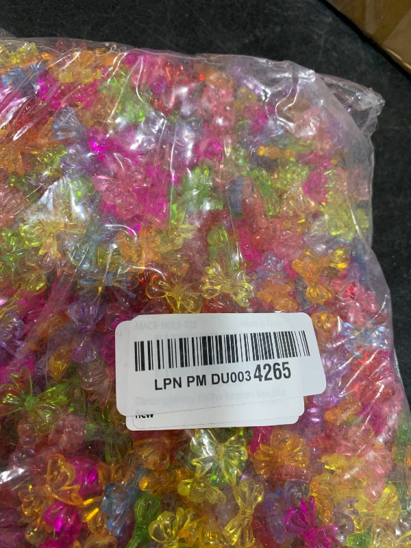 Photo 1 of DanLingJewelry 850Pcs Random Beautiful Bow Acrylic Beads - Transparent Bowknot Spacer for Bracelet Necklace Jewelry Making