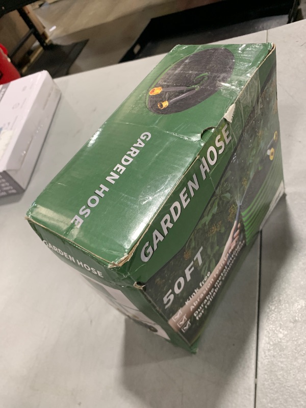 Photo 1 of Toolasin Garden Hose 50ft, Non-Expanding, Lightweight, Leak-Proof Metal interface, No-Knots, Portable, Wear-Resistant, Sturdy, Flexible, 3/4GHT, Water Hose for Yard, Garden, Black Green