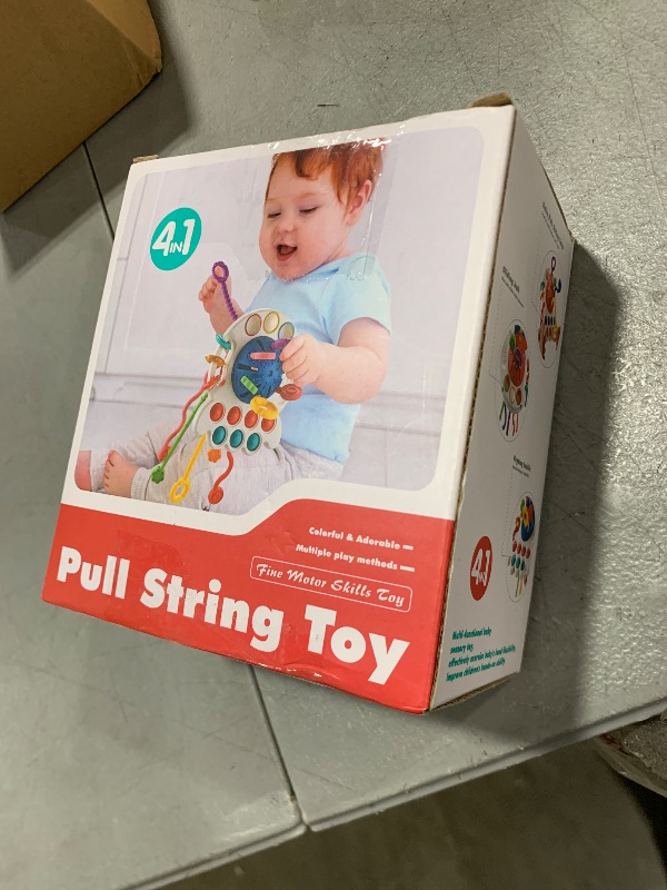 Photo 1 of Tiyol Montessori Toys, Silicone Pull String Activitys, Developmental Pulling Baby Sensory Toy, Car Seat Airplane Travel Toddler Boy &Girl Infant Birthday Gifts