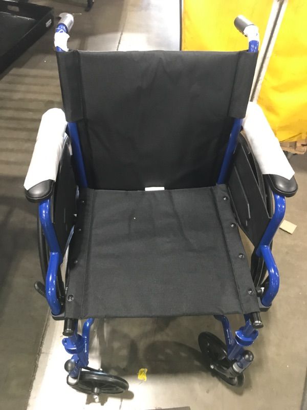 Photo 1 of Drive Medical Blue Streak Lightweight Wheelchair with Swing-Away Footrests and Flip-Back Arms, Portable Folding Wheelchair for Adults and Seniors, 18 Inch Seat