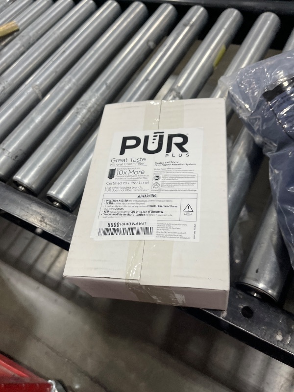 Photo 1 of PUR PLUS Vertical Faucet Mount Water Filtration System, Lead-Reducing Filter, Great-Tasting Water, Easy Install, Lasts 100 Gallons, Compatible with Sinks with External Aerators, Grey