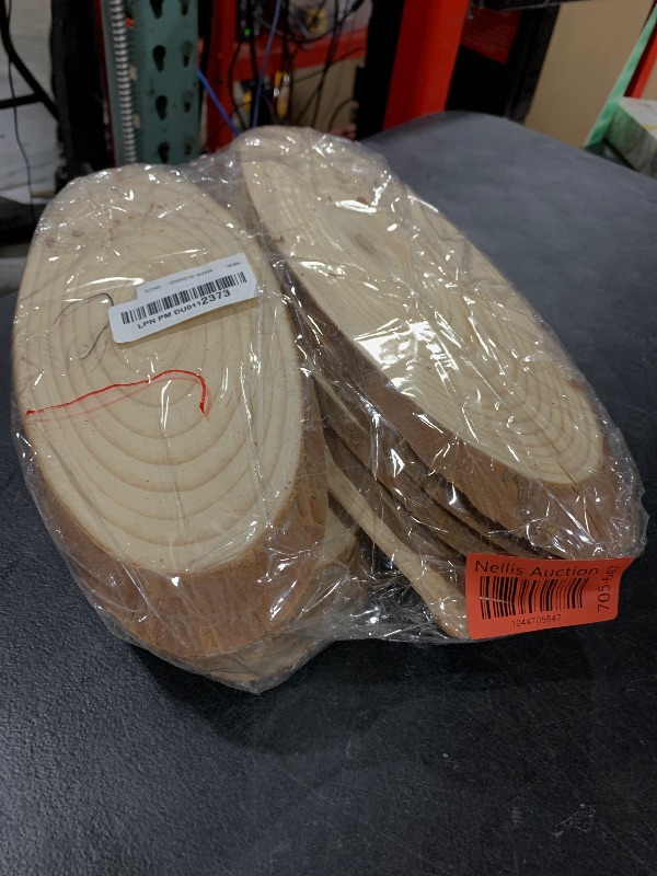 Photo 1 of 10 PCS Oval Wood Slices, Length 12 Inch and Width 3.9-4.7 Inch Craft Wooden Slices, Natural Unfinished Wood Slices for DIY Wedding