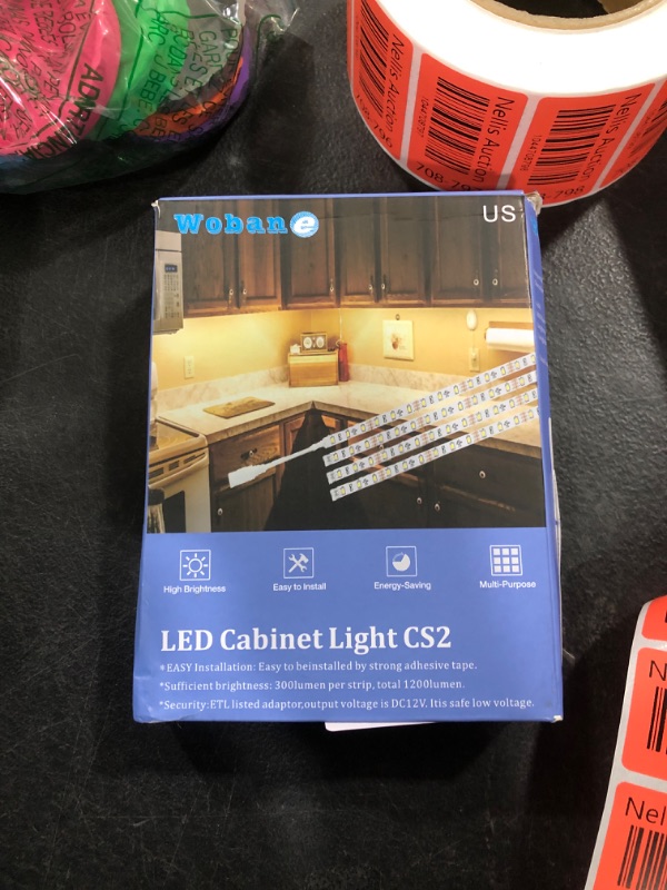 Photo 1 of WOBANE Under Cabinet Lighting Kit,Flexible LED Strip Lights Bar,Under Counter Lights for Kitchen,Cupboard,Desk,Monitor Back,Shelf,6.6 Feet Tape Light Set,ETL Listed,120 LEDs,1100lm,2700K WarmWhite