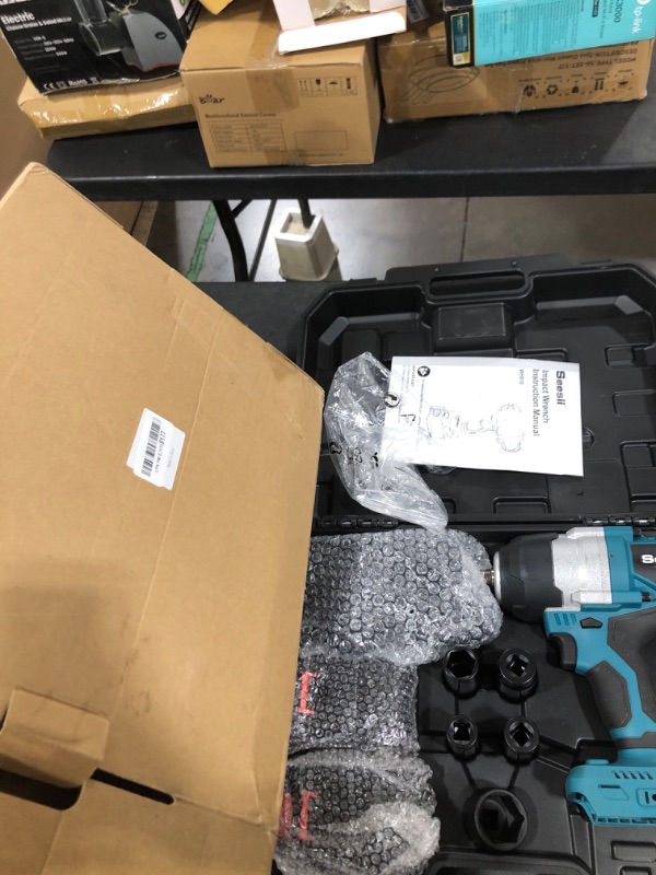 Photo 1 of Seesii Cordless Impact Wrench, 1032Ft-lbs (1400N.m) 1/2 High Torque Brushless Impact Gun 2500IPM, 18V Power Impact Wrench, 5000mAh Battery, 4 Sockets, Variable Speeds for Car/Truck RV/Mower,WH810