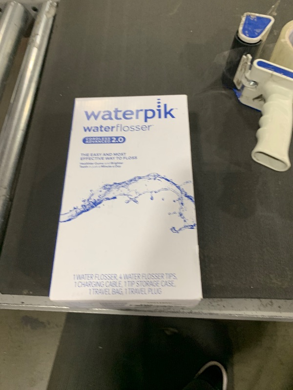 Photo 1 of Waterpik Cordless Advanced 2.0 Water Flosser For Teeth, Gums, Braces, Dental Care With Travel Bag and 4 Tips, ADA Accepted, Rechargeable, Portable, and Waterproof, Blue WP-583, Packaging May Vary