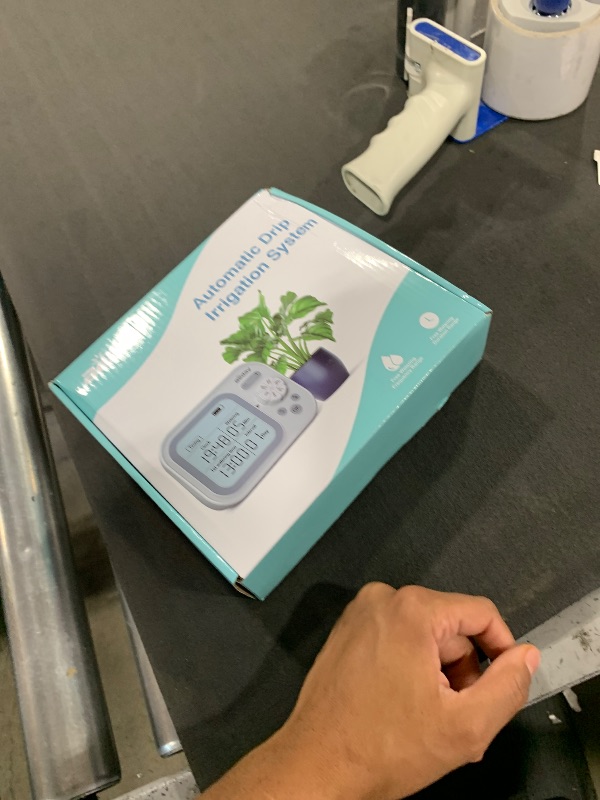 Photo 1 of Automatic Plant Waterer Indoor Self Watering System for 15 Potted Plants, Auto Drip Irrigation Kit Programmable Water Timer with Smart Humidity Detection
