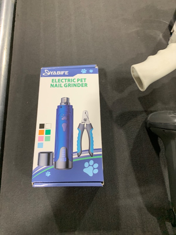 Photo 1 of Dog Nail Trimmers and Dog Nail Clippers Kit, Whisper Quiet Electric Grinder with Light, Rechargeable, for Small, Medium, Large Dogs, Cats Toenail & Claw Grooming, 3 Speeds