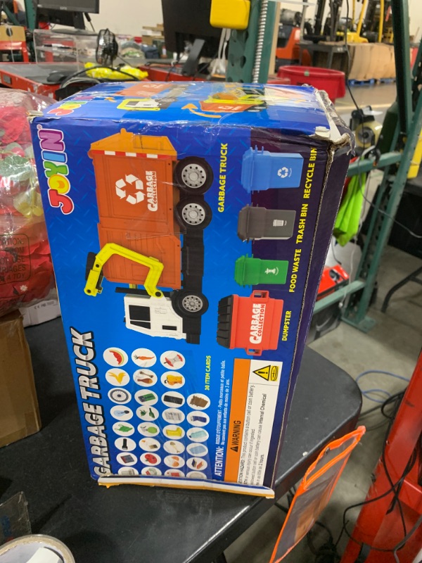 Photo 1 of JOYIN Large Friction Powered Garbage Truck Toy Set, Includes Dumpster, Trash Bins, and Learning Cards for Kids, Orange