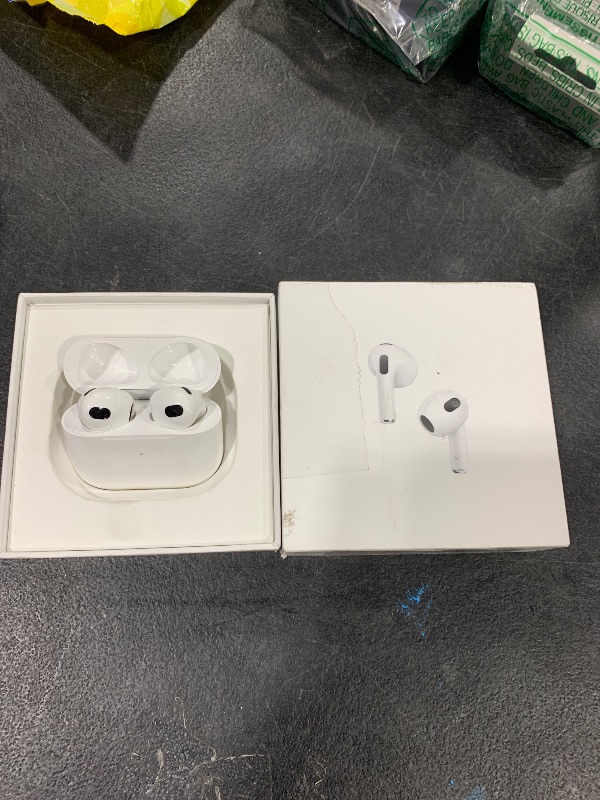 Photo 1 of Apple AirPods (3rd Generation) Wireless Ear Buds, Bluetooth Headphones, Personalized Spatial Audio, Sweat and Water Resistant, Lightning Charging Case Included, Up to 30 Hours of Battery Life