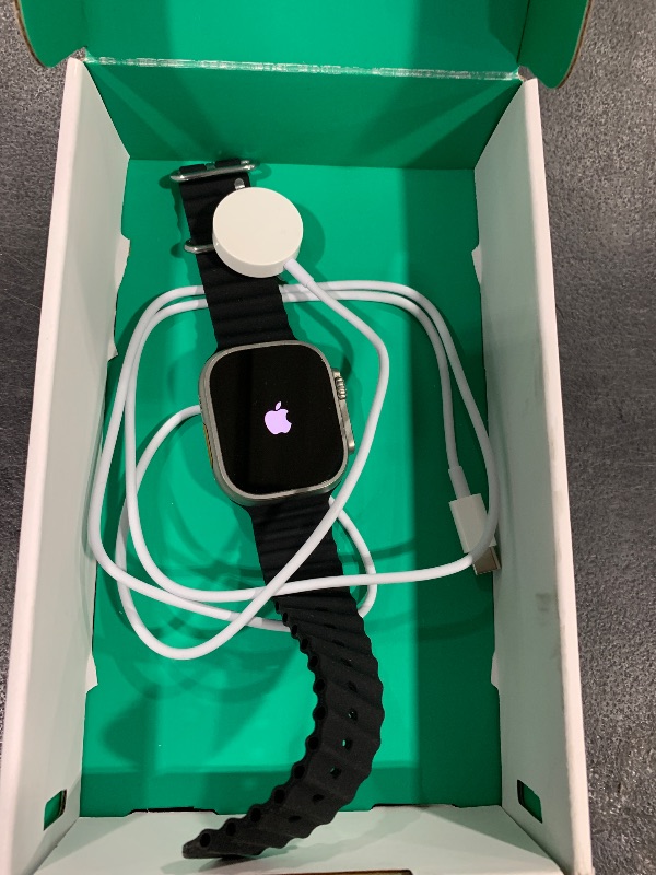 Photo 1 of Apple Watch Ultra [GPS + Cellular 49mm] Titanium Case with Midnight Ocean Band, One Size (Renewed Premium)