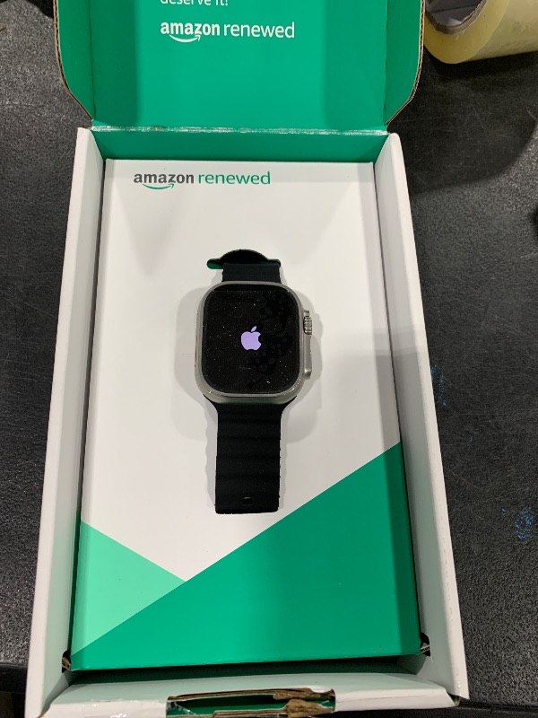 Photo 1 of Apple Watch Ultra [GPS + Cellular 49mm] Titanium Case with Midnight Ocean Band, One Size (Renewed Premium)