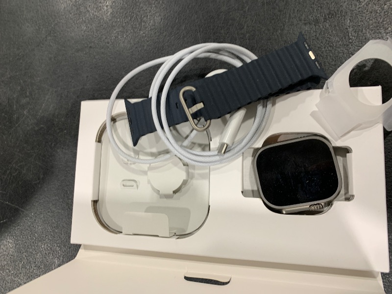 Photo 1 of Apple Watch Ultra [GPS + Cellular 49mm] Titanium Case with Midnight Ocean Band, One Size (Renewed Premium)