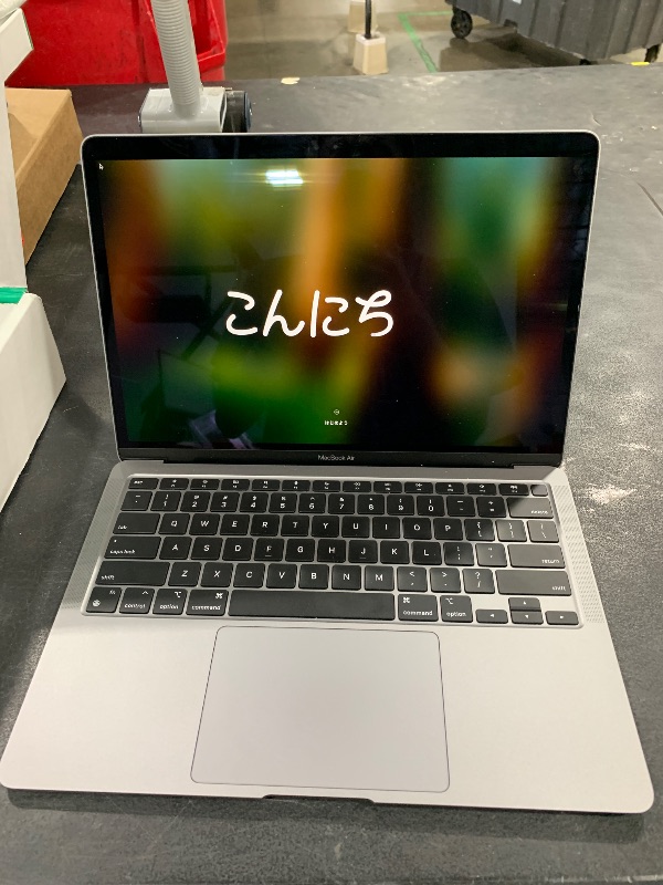 Photo 1 of Late 2020 Apple MacBook Air with Apple M1 Chip (13.3 inch, 8GB RAM, 256GB SSD) Space Gray (Renewed Premium)