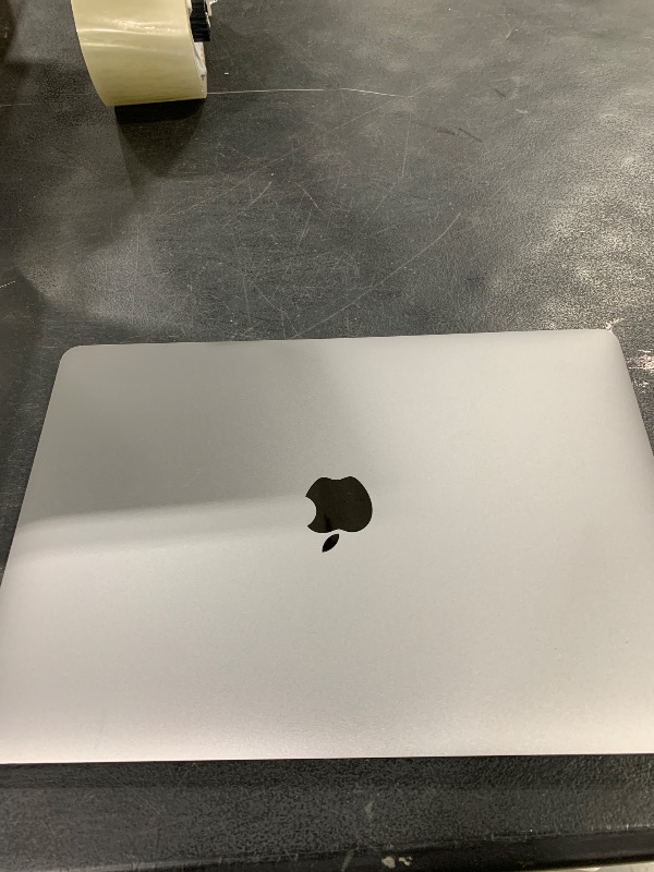 Photo 1 of Late 2020 Apple MacBook Air with Apple M1 Chip (13.3 inch, 8GB RAM, 256GB SSD) Space Gray (Renewed Premium)