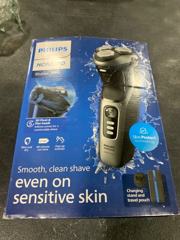 Photo 1 of Philips Norelco Shaver 3900 Series, Wet and Dry Electric Shaver, P-Cap, Travel Pouch, Charging Stand, Storm Blue, Model S3341/92