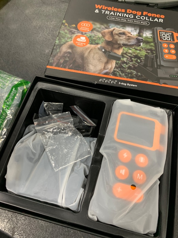 Photo 1 of Wireless Dog Fence System - Electric Fence for Dogs 1000 FT Range Adjustable,Dog Training Collar with Remote Control 3 Training Modes, Rechargeable Collar,Dog Fence Wireless Magnetic Charging Base