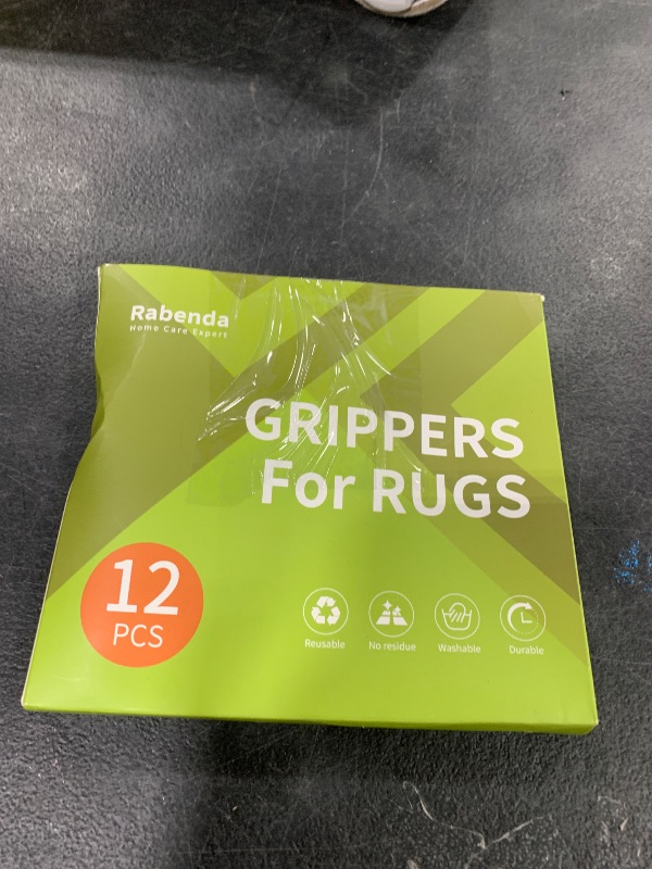 Photo 1 of Rabenda 12 Pcs Rug Tape, Non Slip Rug Pads Grippers for Hardwood Floors and Tiles, Reusable Carpet Tape for Area Rugs, Double-Sided Adhesive Rug Stickers Keep Corners Flat (Black)