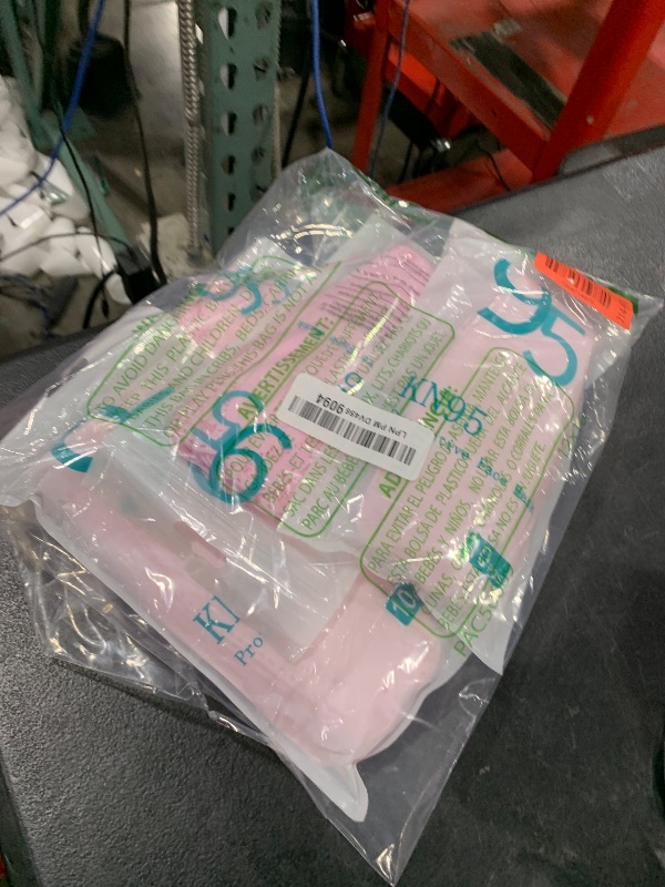 Photo 1 of protective pink face masks 