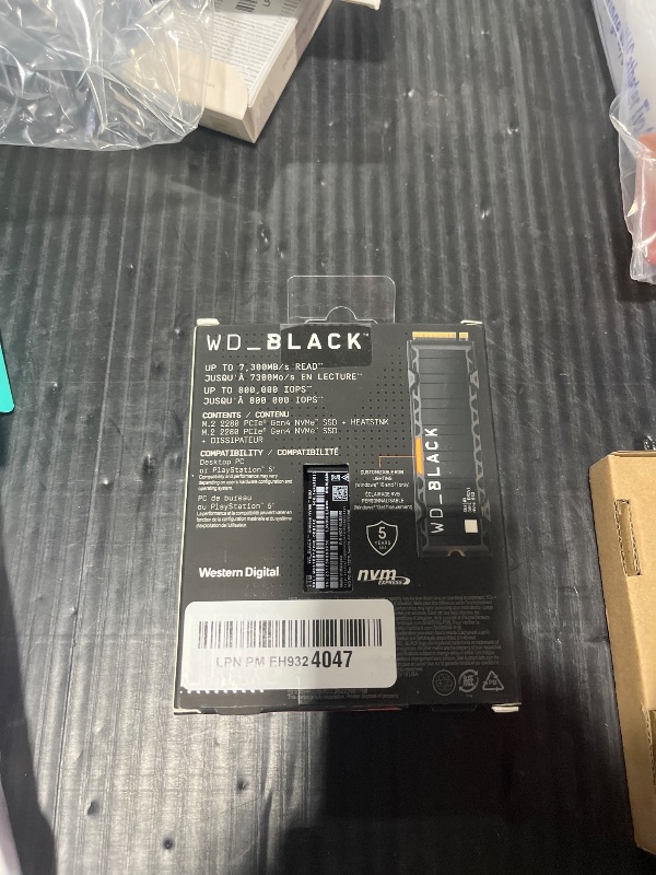 Photo 1 of WD_BLACK 1TB SN850X NVMe Internal Gaming Solid State Drive with Heatsink - Works with Playstation 5, Gen4 PCIe, M.2 2280, Up to 7,300 MB/s - WDS100T2XHE