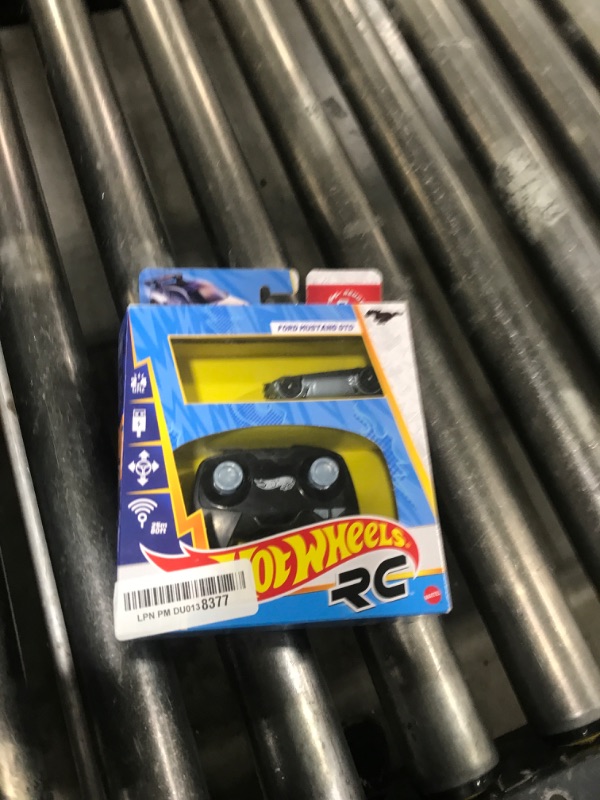 Photo 1 of Hot Wheels RC Toy Car, Full-Function Remote-Control 1:64 Scale Ford Mustang, Booster Button to Race & Stunt On- or Off-Track, Recharge with USB Cable