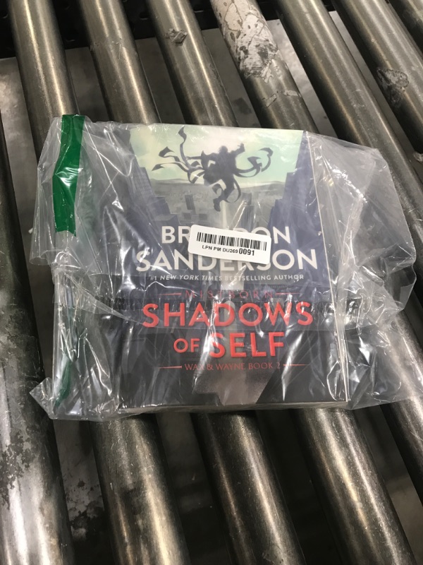 Photo 1 of Shadows of Self: A Mistborn Novel (The Mistborn Saga, 5) Paperback – August 1, 2023
