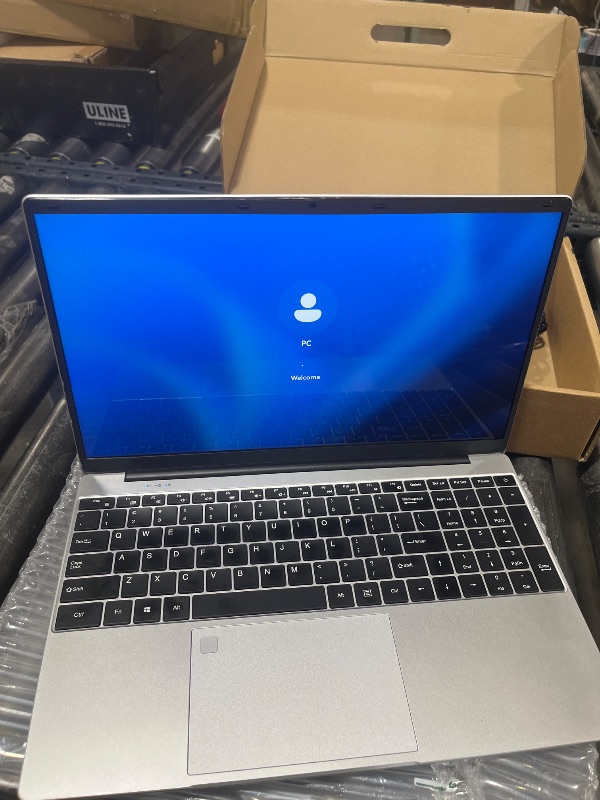 Photo 1 of VGKE 15.6" Laptop Computer, Full HD 1920 * 1080p Laptop with Backlit Keyboard, Celeron Quad-Core J4125 Processor, 12GB DDR4 RAM 256GB SSD, Webcam, Fingerprint Reader, Silver
