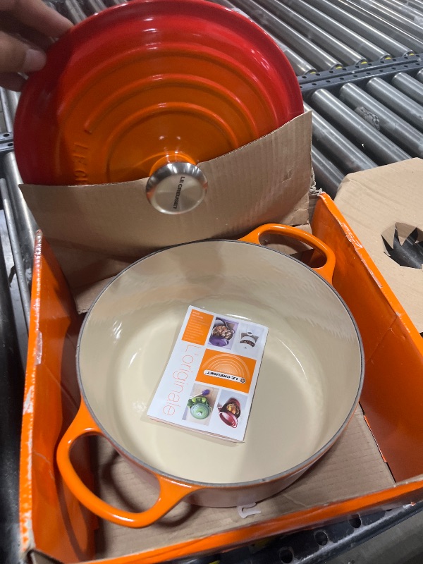 Photo 1 of Le Creuset Enameled Cast Iron Signature Round Dutch Oven with Lid, 5.5 Quart, Flame