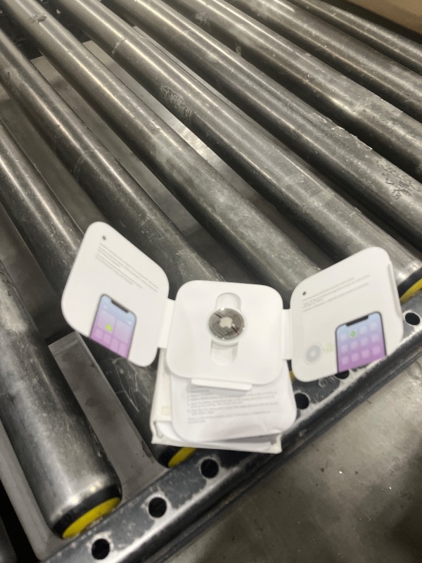 Photo 1 of Apple AirTag. Keep Track of and find Your Keys, Wallet, Luggage, Backpack, and More. Simple one-tap Set up with iPhone or iPad