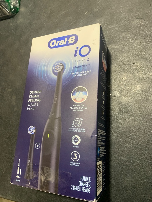 Photo 1 of Oral-B iO Series 2 Rechargeable Electric Powered Toothbrush Starter Kit, Night Black with 2 Brush Heads - Automatic Pressure Sensor to Protect Gums - 3 Modes - 2 Min Timer