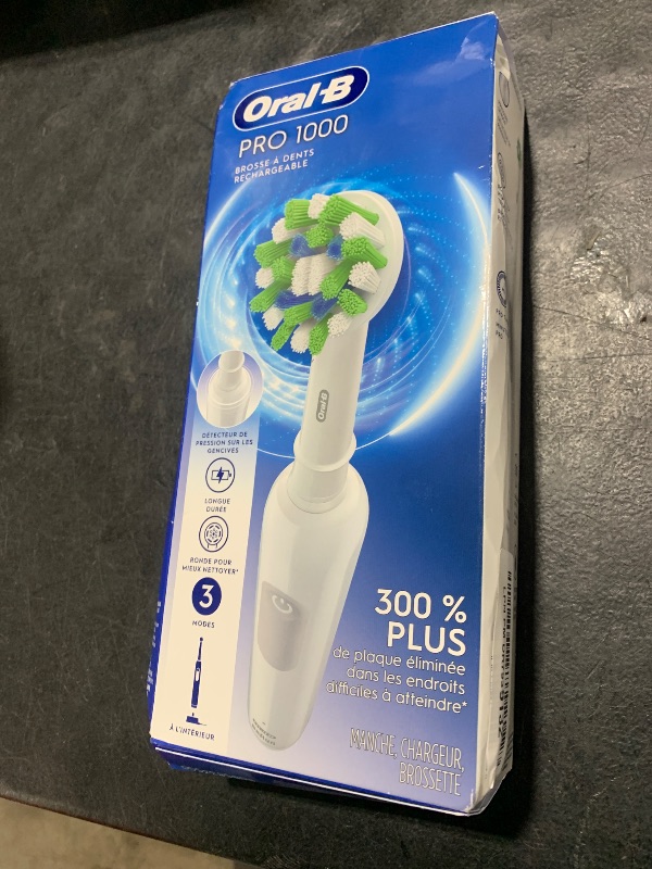 Photo 1 of Oral-B Pro 1000 Rechargeable Electric Toothbrush, White