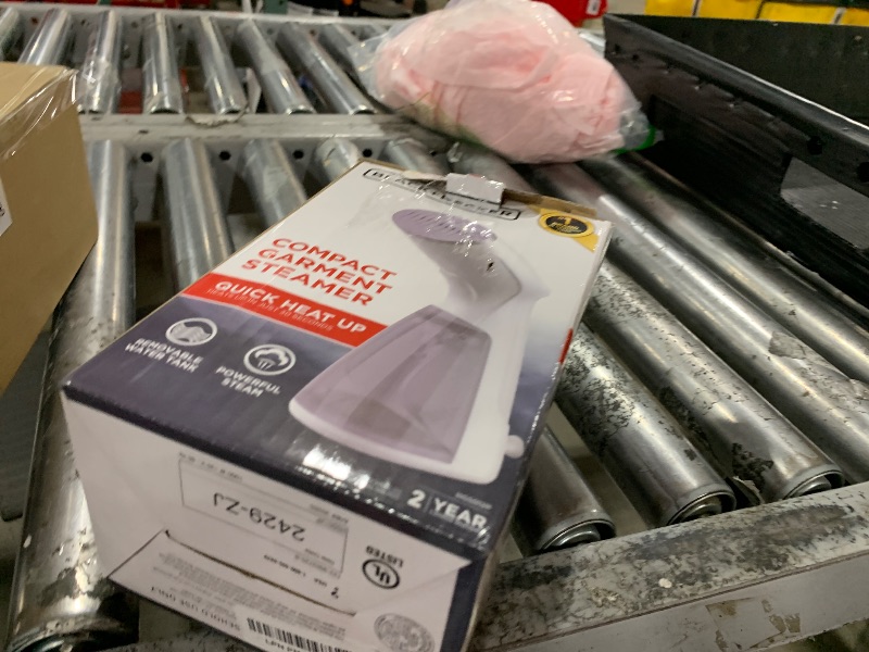 Photo 1 of BLACK+DECKER Compact Handheld Steamer, HGS012P, 25-Second Heat Up, 1000 Watts, Removes Wrinkles from Fabrics, Clothing and Upholstery