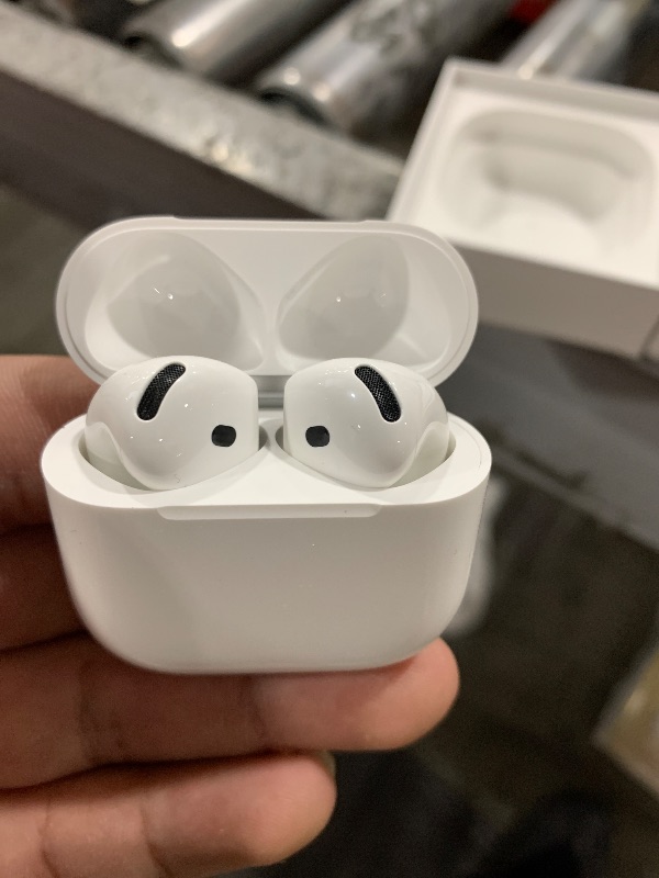 Photo 1 of Apple AirPods 4 Wireless Earbuds, Bluetooth Headphones, Personalized Spatial Audio, Sweat and Water Resistant, USB-C Charging Case, H2 Chip, Up to 30 Hours of Battery Life, Effortless Setup for iPhone