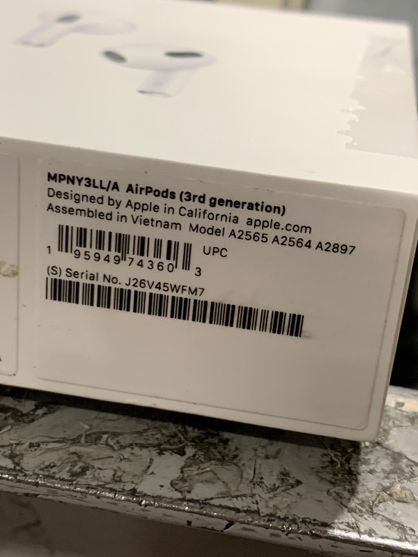 Photo 1 of Apple AirPods with Lightning Charging Case (3rd Generation) (Renewed)