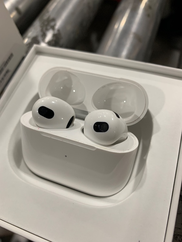 Photo 1 of Apple AirPods with Lightning Charging Case (3rd Generation) (Renewed)