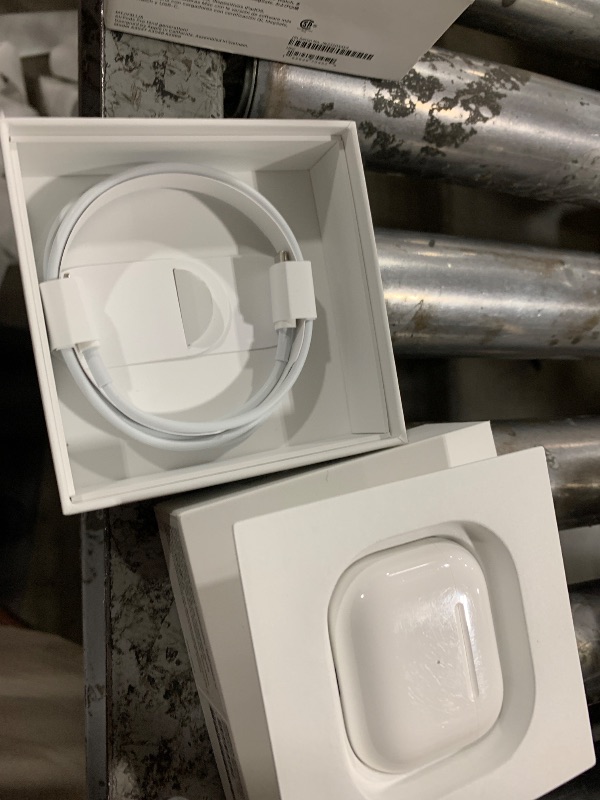 Photo 1 of Apple AirPods with Lightning Charging Case (3rd Generation) (Renewed)