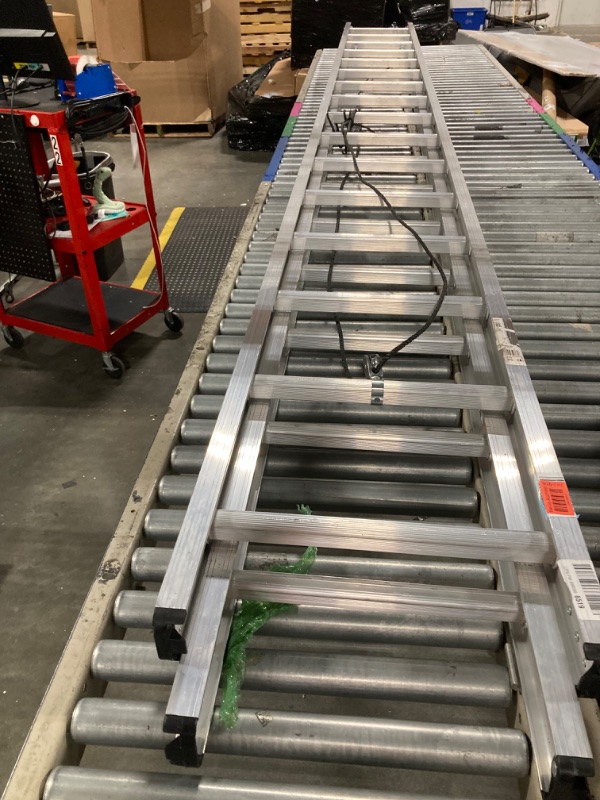 Photo 1 of **WILL NEED TRUCK FOR PICK UP**
Louisville Ladder 32-foot Aluminium Extension Ladder, 300-Pound Load Capacity, Type IA, AE2232